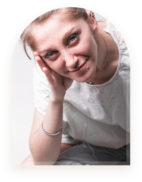 A young woman resting her head on her hand